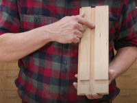 Demonstrating woodworking joinery cuts