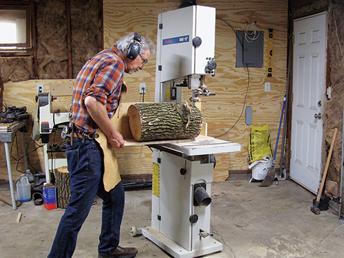 Sawing a bowl blank from a log at a band saw