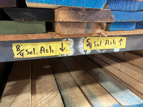 Ash lumber that has been labeled by quarter thickness