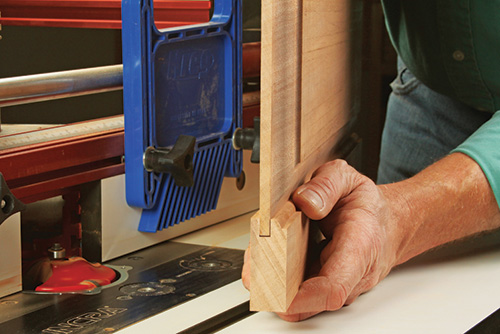 Creating a door frame with door-making bit set on a router table