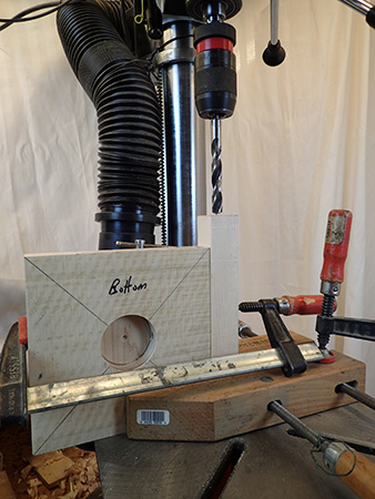 Clamping set-up for lamp blank in a drill press