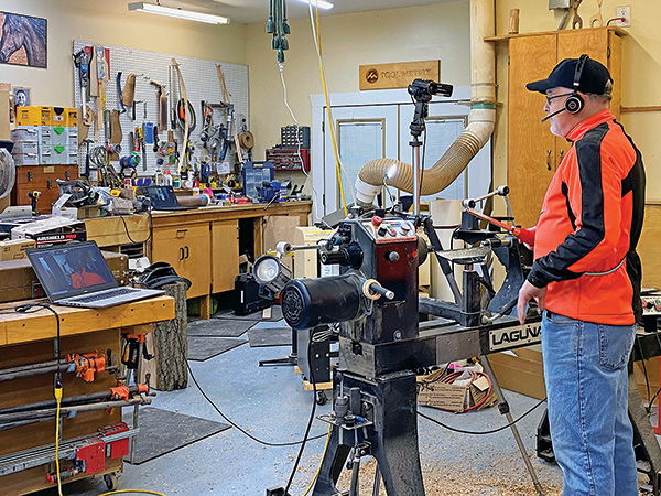 Program founder Paul Mayer teaches a spindle-turning class to VetsTurn learners via Zoom from his home workshop.