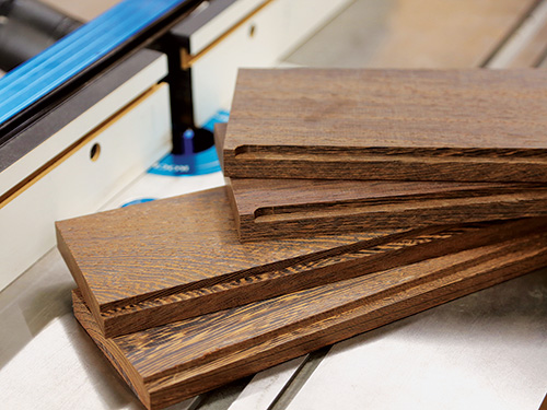 Recesses cut in wine cabinet panels for adding backing panel